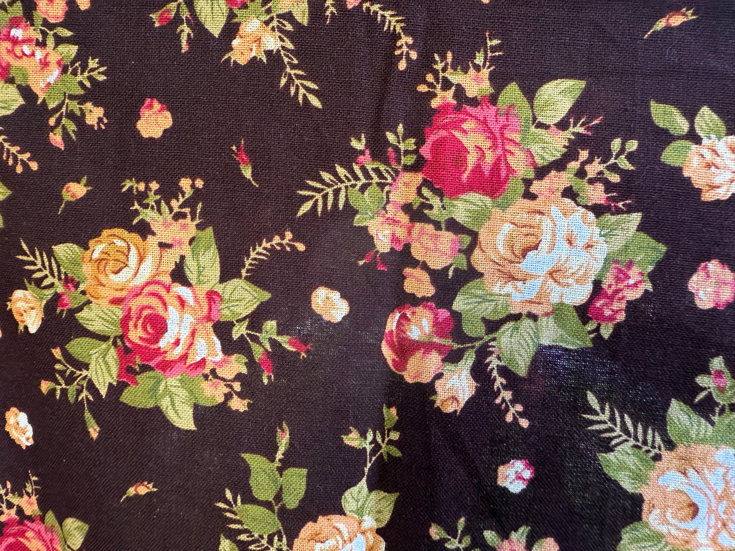 Floral pattern on dark brown background