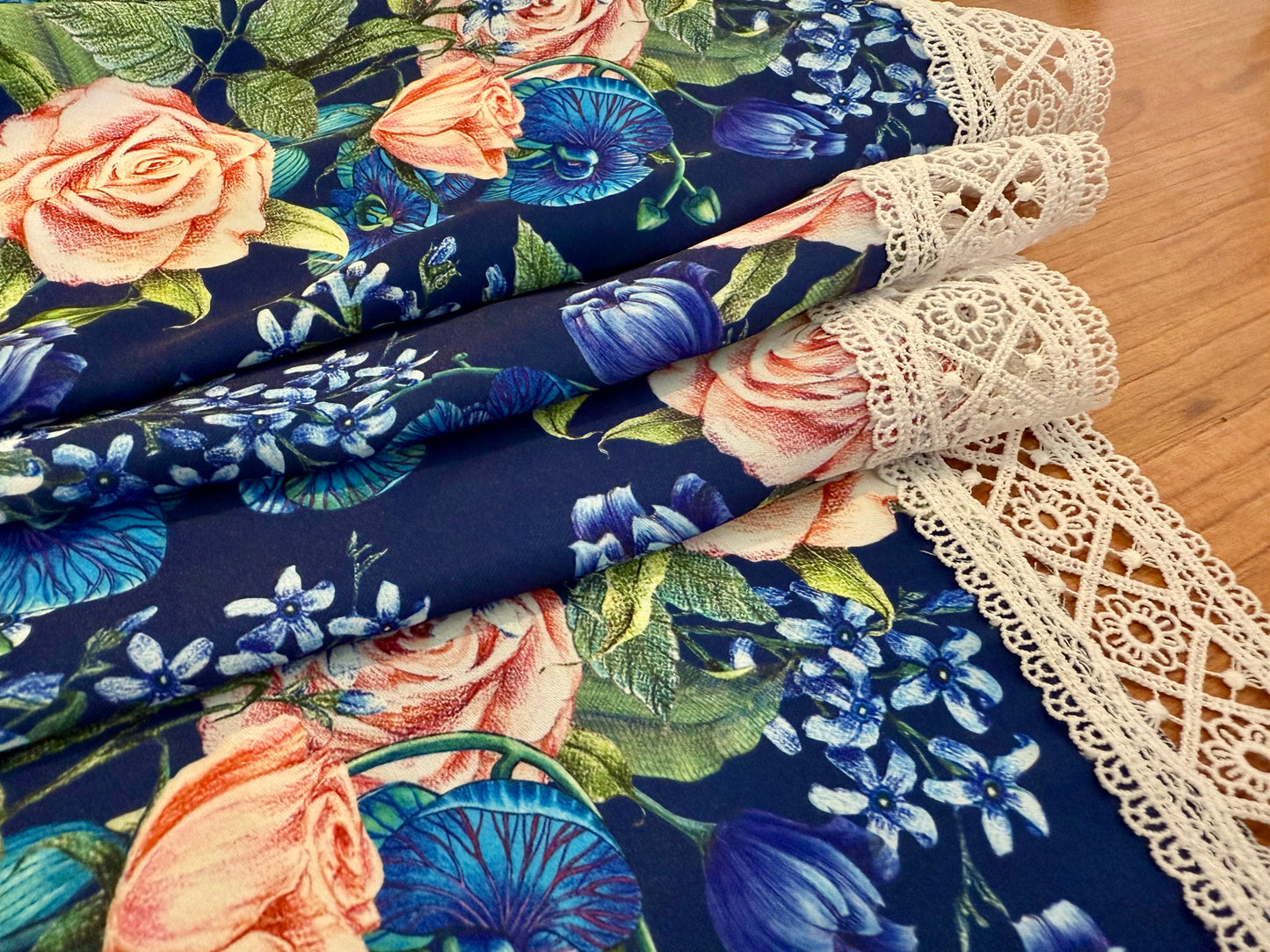 Square tablecloth with flowers on  dark blue background