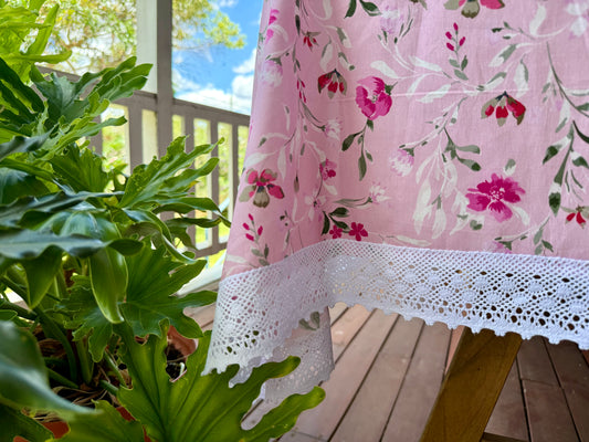 Tablecloth for large table with flowers on light pink background