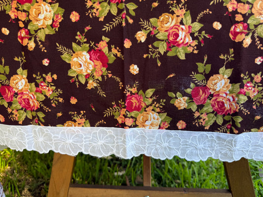 Floral pattern on dark brown background